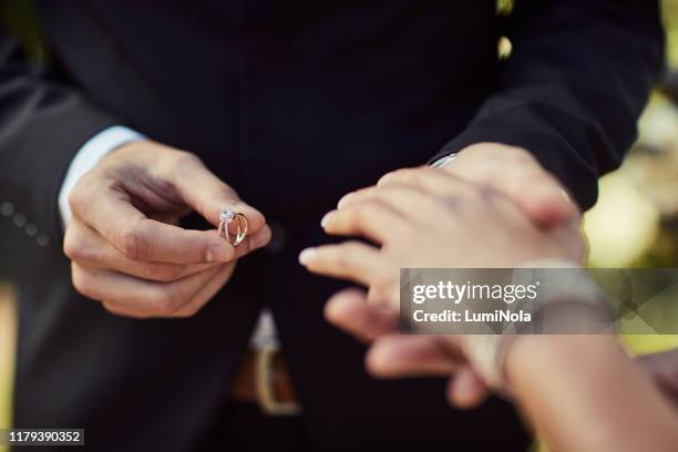 Echanging Rings Couple Exchanging Rings Photos and Premium High Res Pictures - Getty Images