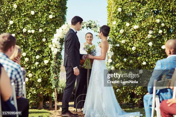 you may now kiss the bride! - outdoor wedding ceremony vows stock pictures, royalty-free photos & images