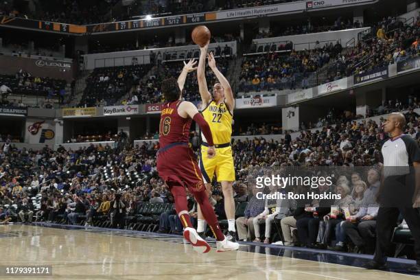 Leaf of the Indiana Pacers shoots the ball against Cedi Osman of the Cleveland Cavaliers on November 1, 2019 at Bankers Life Fieldhouse in...