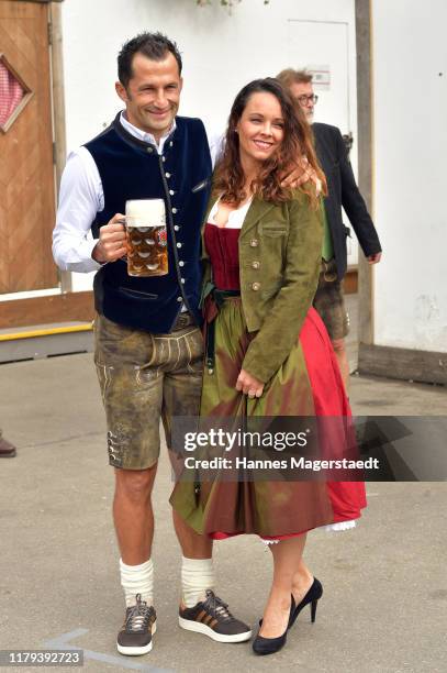 Bayern Muenchen sporting director Hasan Salihamidzic and his wife Esther Copado attend the Oktoberfest at Kaefer Wiesenschaenke tent at...