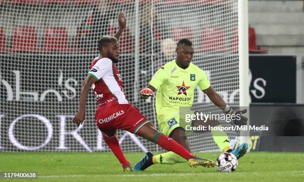 Cyle Larin of Zulte battles for the ball with Loic Badiashile of Cercle during the Jupiler Pro League match between SV Zulte Waregem and Cercle...