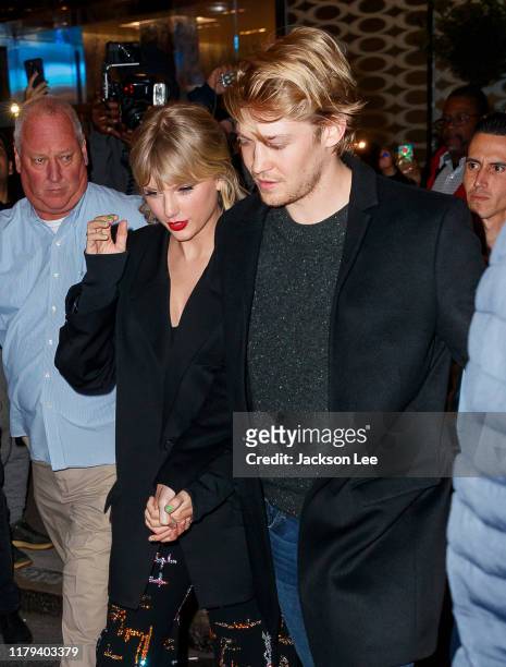 Taylor Swift and Joe Alwyn depart Zuma on October 06, 2019 in New York City.
