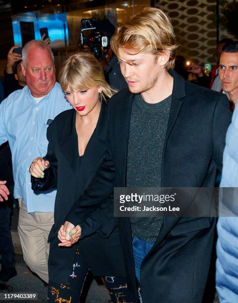 Taylor Swift and Joe Alwyn depart Zuma on October 06, 2019 in New York City.