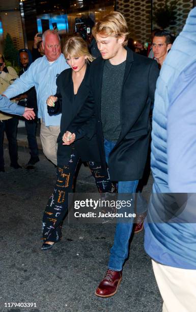 Taylor Swift and Joe Alwyn depart Zuma on October 06, 2019 in New York City.