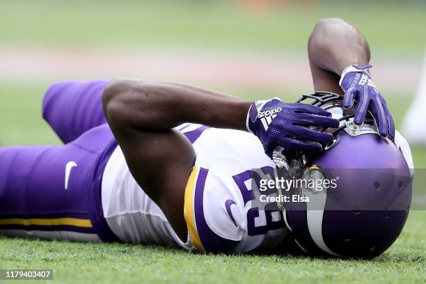 Xavier Rhodes of the Minnesota Vikings lays on the ground after a play against the New York Giants during the first quarter in the game at MetLife...