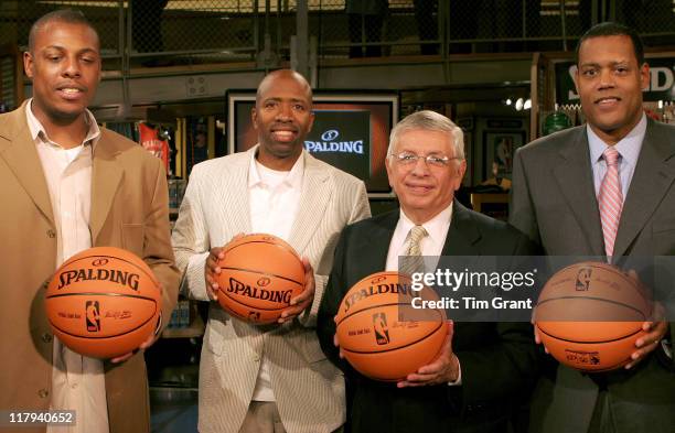 Paul Pierce, Kenny Smith, David Stern and Stu Jackson at a news conference to unveil the new NBA ball at the NBA Store in New York City, New York on...