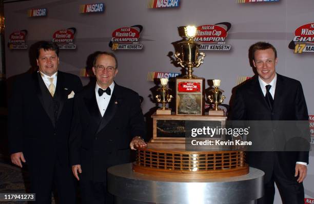 Winston Cup Champion, Matt Kenseth poses with crew chief, Robbie Risner and car owner, Jack Roush.