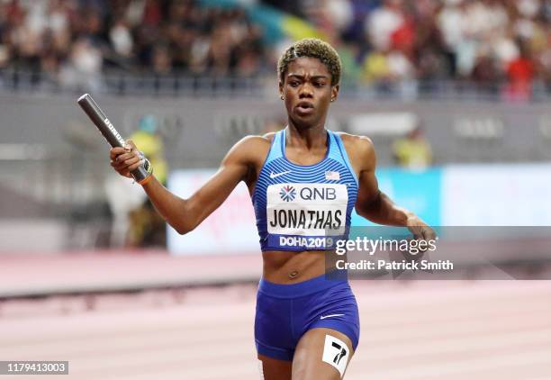 Wadeline Jonathas of the United States crosses the finish line to win gold for the United States in the Women's 4x400 metres relay final during day...