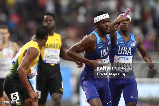 Rai Benjamin of the United States gets the baton from Wilbert London in the Men's 4x400 metres relay final during day ten of 17th IAAF World...