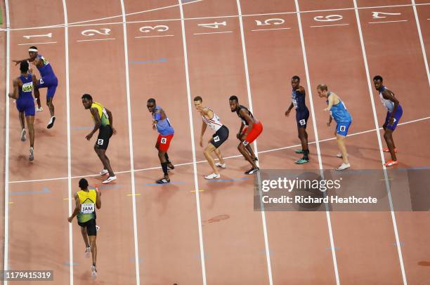 Wilbert London of the United States gets the baton from Michael Cherry in the Men's 4x400 metres relay final during day ten of 17th IAAF World...