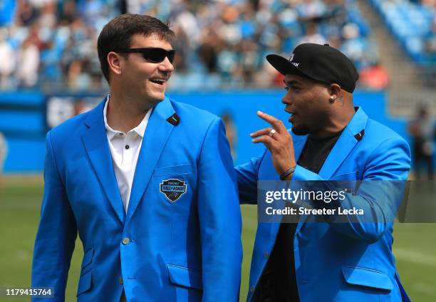 Former Carolina Panthers players, Jake Delhomme and Steve Smith speak before the game against the Jacksonville Jaguars at Bank of America Stadium on...