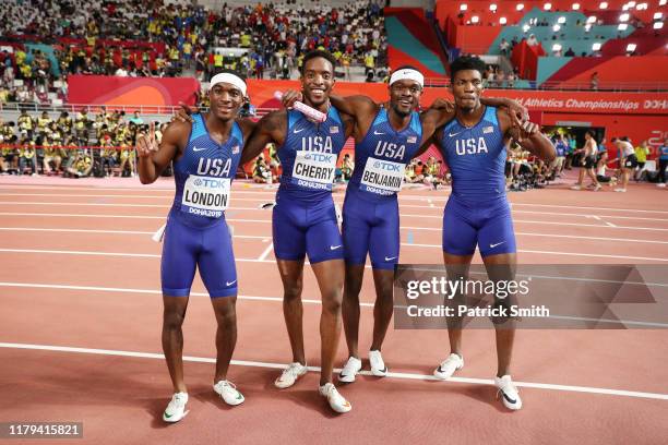 Fred Kerley, Michael Cherry, Wilbert London, and Rai Benjamin of the United States celebrate winning gold in the Men's 4x400 metres relay final...