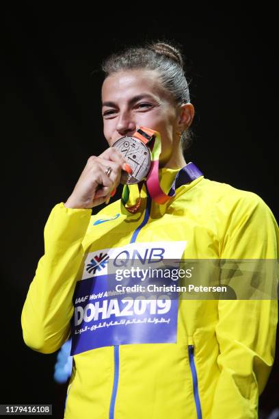 Silver medalist Maryna Bekh-Romanchuk of Ukraine stands on the podium during the medal ceremony for the Women's Long Jump during day ten of 17th IAAF...