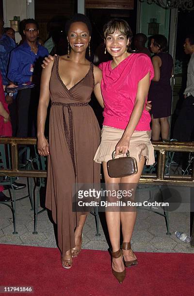 Bushe Wright and Rosario Dawson during 2003 NBA Draft Party in New York City at American Park Cafe in New York City, New York, United States.