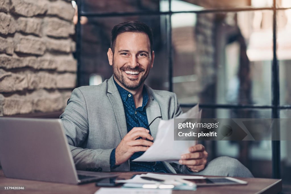 Young businessman in his office