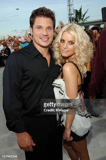 Nick Lachey and Jessica Simpson during 2005 MTV Video Music Awards - White Carpet at American Airlines Arena in Miami, Florida, United States.