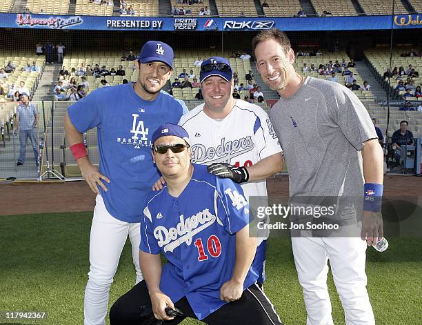 Comedian Carlos Mencia and Gary Valentine poses with Los Angeles Dodgers Nomar Garciaparra and Luis Gonzalez during Hollywood Stars Night Saturday,...