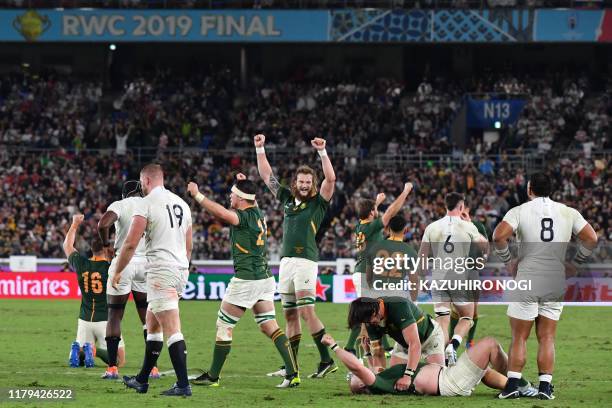 South Africa's players celebrate winning the Japan 2019 Rugby World Cup final match between England and South Africa at the International Stadium...