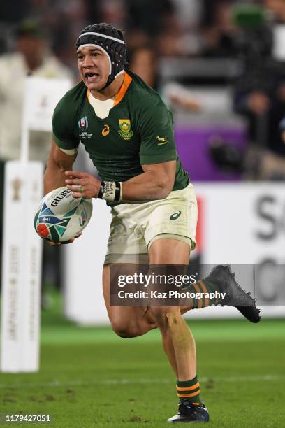 Cheslin Kolbe of South Africa scores his team's second try during the Rugby World Cup 2019 Final between England and South Africa at International...