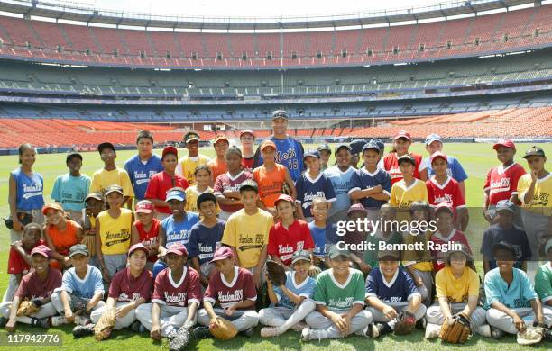 New York Mets Carlos Beltran and players at his "Harlem RBI" clinic at Shea Stadium in Queens, New York on August 8, 2006. Beltran pledged $500 for...