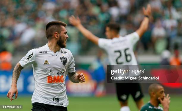 Hathan of Atletico MG celebrates after scoring his team's first goal during a match between Palmeiras and Atletico MG for the Brasileirao Series A...