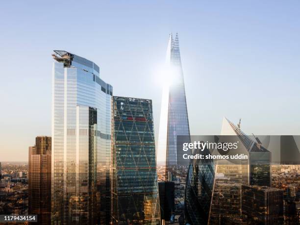 multiple exposure of futuristic skyscrapers - elevated view - london skyscraper stock pictures, royalty-free photos & images