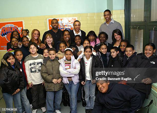 Marty Collins, John Starks and Channing Frye with students