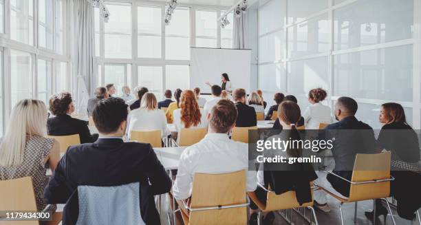 indian businesswoman leading the seminar - education building stock pictures, royalty-free photos & images
