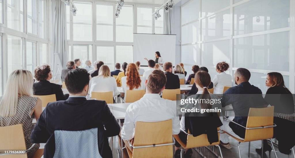 Indian businesswoman leading the seminar