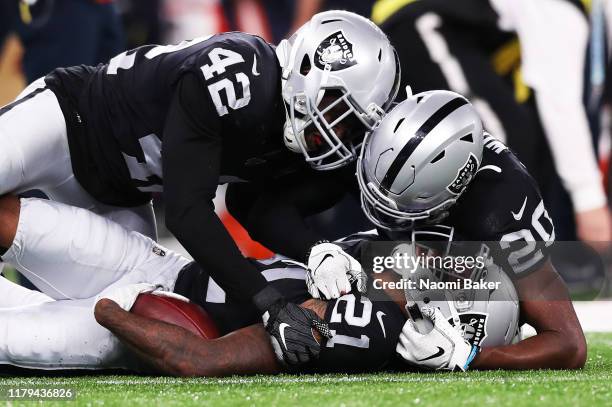 Karl Joseph of Oakland Raiders , Daryl Worley of Oakland Raiders and Gareon Conley of Oakland Raiders celebrate after Gareon Conley intercepts the...