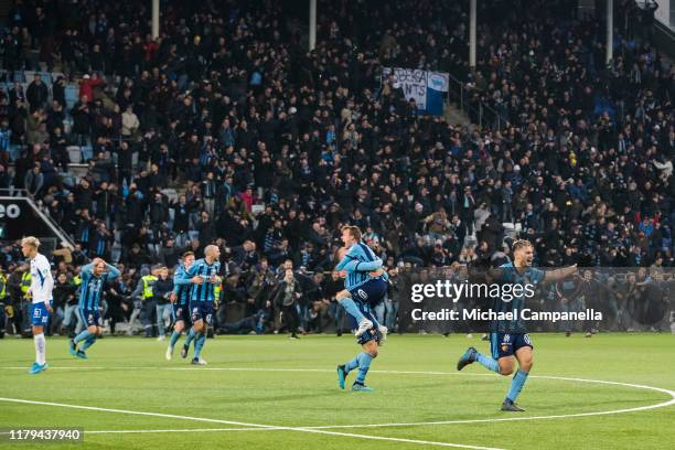 Players from Djurgardens IF celebrate after the final whistle and their win of the 2019 Allsvenskan season during an Allsvenskan match between IFK...