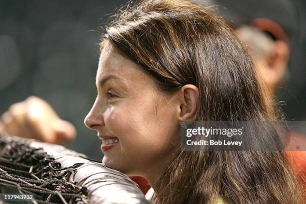 Actress Ashley Judd watches batting practice before the Reds and Astros game, May 30, 2007 at Minute Maid Park in Houston, Texas. Her husband, Dario...