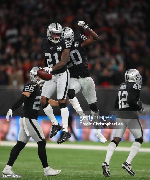 Gareon Conley of Oakland Raiders celebrates his interception in the last few minutes with Daryl Worley of Oakland Raiders during the game between...