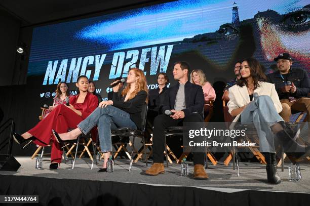 Kennedy McMann, Scott Wolf, and Leah Lewis speak onstage during the "Nancy Drew" Panel at New York Comic Con 2019 Day 4 at Jacob K. Javits Convention...