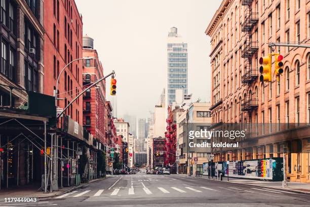 soho district empty street early morning , manhattan , new york - broadway manhattan stock pictures, royalty-free photos & images