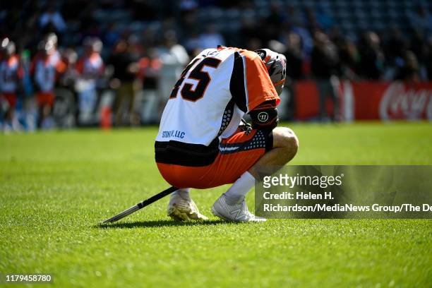 Denver Outlaws attackman Ryan Lee, #45, is dejected after the Chesapeake Bayhawks' score during the first half of the MLL championship game at Dick's...