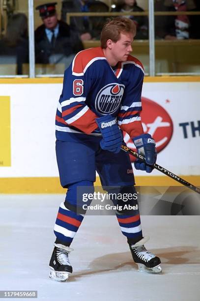 Ken Sutton of the Edmonton Oilers skates against the Toronto Maple Leafs during NHL game action on December 23, 1995 at Maple Leaf Gardens in...