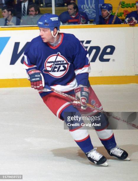 Alex Zhamnov of the Winnipeg Jets skates against the Toronto Maple Leafs during NHL game action on November 18, 1995 at Maple Leaf Gardens in...