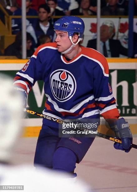 Ken Sutton of the Edmonton Oilers skates against the Toronto Maple Leafs during NHL game action on December 23, 1995 at Maple Leaf Gardens in...