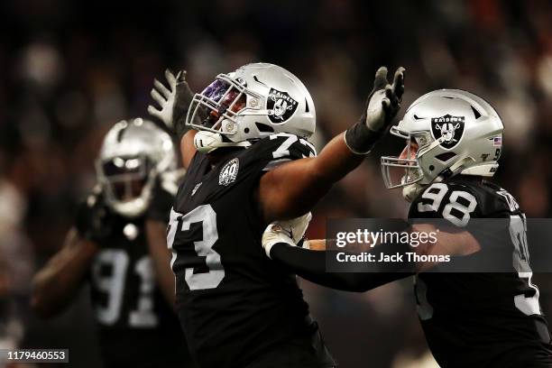 Maurice Hurst of the Oakland Raiders celebrates after sacking Chase Daniel of the Chicago Bears on the last play of the game during the match between...