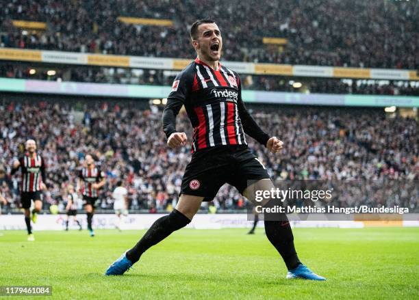 Filip Kostic of Frankfurt celebrates after scoring his team's first goal during the Bundesliga match between Eintracht Frankfurt and FC Bayern...