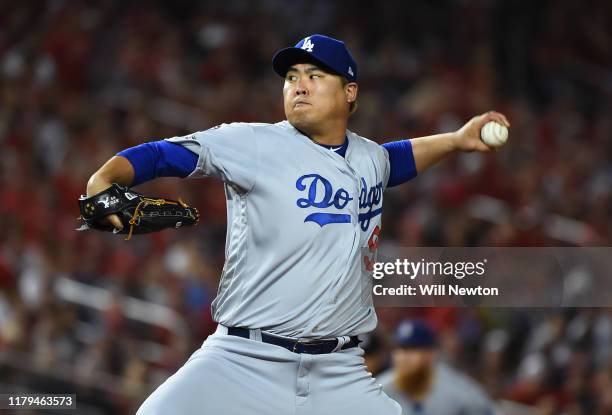 Pitcher Hyun-Jin Ryu of the Los Angeles Dodgers delivers in the first inning of Game 3 of the NLDS against the Washington Nationals at Nationals Park...