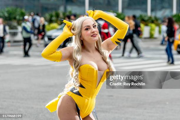 Cosplayer dressed as Pikachu from Pokémon at New York Comic Con on October 05, 2019 in New York City.