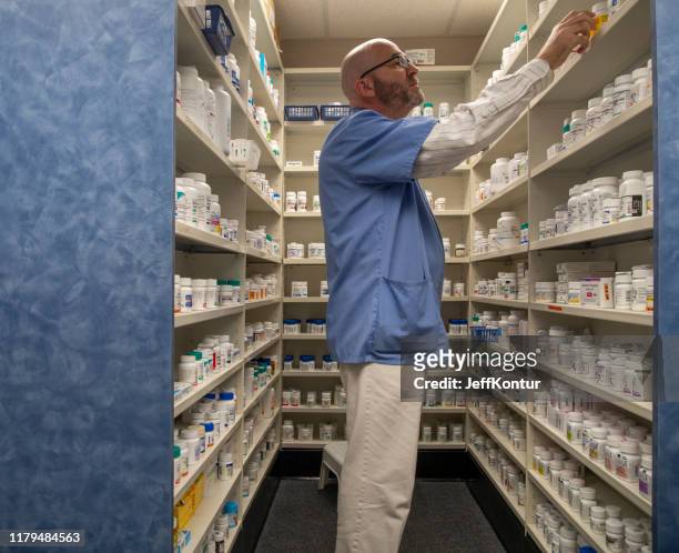 pharmacist at work - kontur stock pictures, royalty-free photos & images