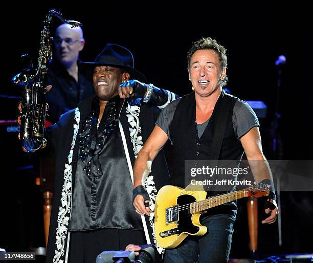 Clarence Clemons and Bruce Springsteen of the E Street Band perform on stage during Bonnaroo 2009 on June 13, 2009 in Manchester, Tennessee.