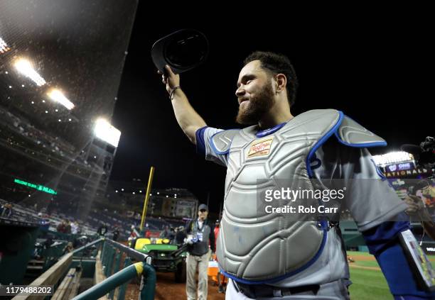 Catcher Russell Martin of the Los Angeles Dodgers acknowledges the crowd after the Dodgers defeated the Washington Nationals 10-4 in Game 3 of the...