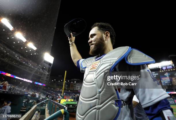 Catcher Russell Martin of the Los Angeles Dodgers acknowledges the crowd after the Dodgers defeated the Washington Nationals 10-4 in Game 3 of the...