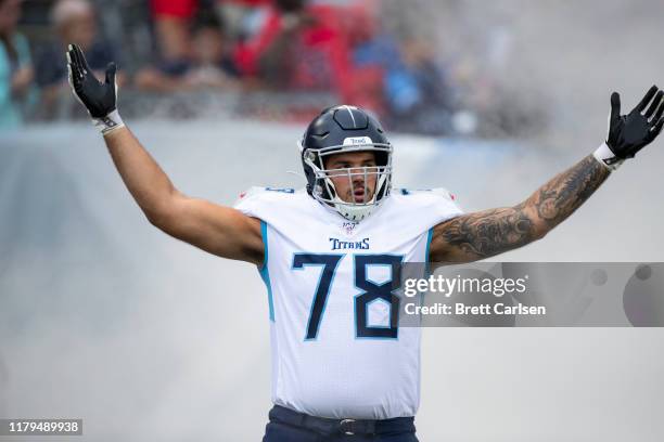 Jack Conklin of the Tennessee Titans runs onto the field before the game against the Buffalo Bills at Nissan Stadium on October 6, 2019 in Nashville,...