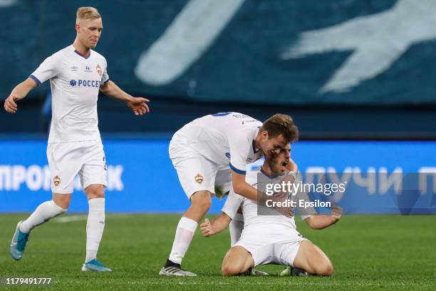 Nikola Vlasic of PFC CSKA Moscow celebrates his goal with Vadim Karpov and Hordur Bjorgvin Magnusson during the Russian Premier League match between...