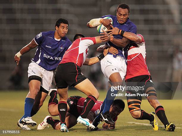 Sailosi Tagicakibau of Samoa in action during the IRB Pacific Nations Cup match between Japan and Samoa at Prince Chichibu Memorial Stadium on July...